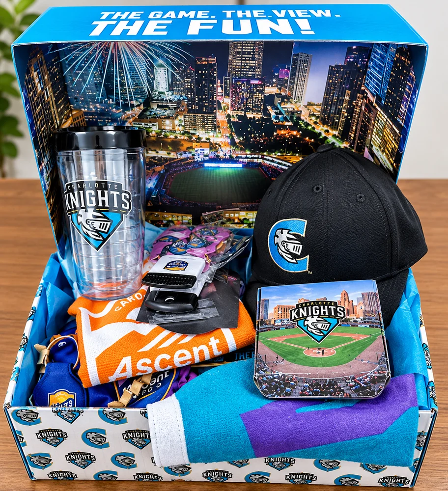 Charlotte Knights gift box with a tumbler, cap, blanket, towel, pennant and lanyard.
