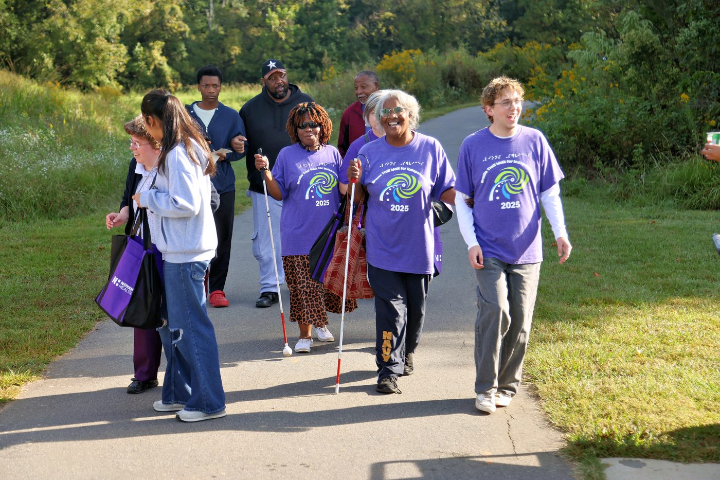 Group photo from the 2025 Braille Trail Walk for Independence celebrating community turnout
