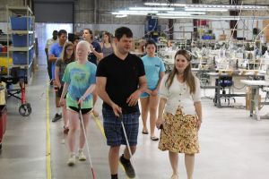 Discussing Training Opportunities While Touring the Facility shown in this image.