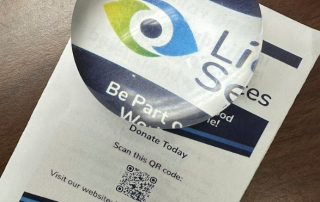 Lions Services Logo Magnified Using a Glass Ball-Style Magnifier