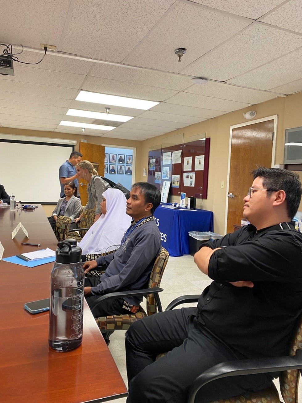 Image of Delegates from Indonesia Sitting at Conference Table