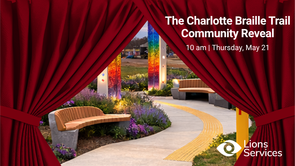 Image of red curtains pulling back to show sneak peak of colorful sculpture of new braille trail